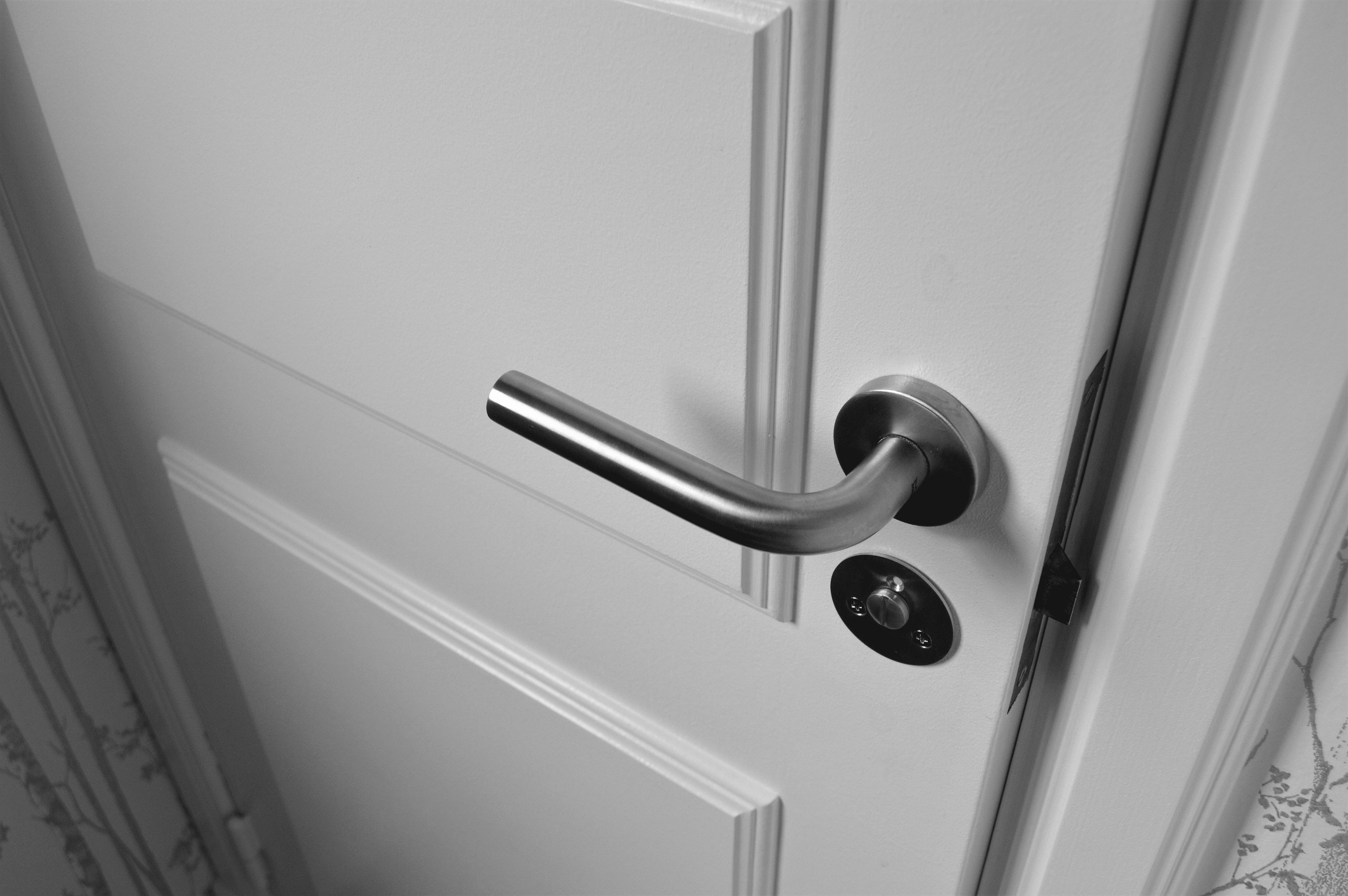 semi-open-white-wooden-door-965878.jpg